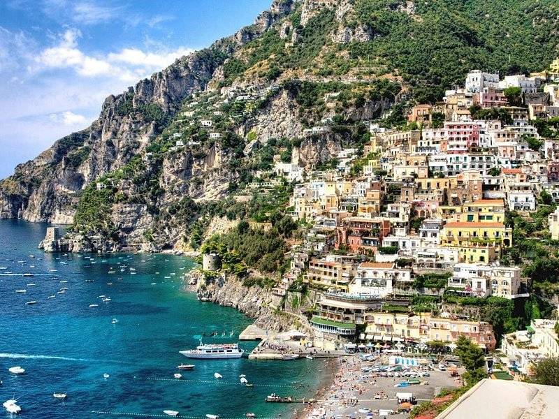 Positano's main beach and waterfront seen from the cliffs